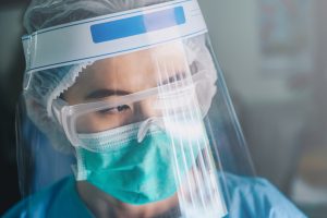 Nurse in personal protective gear