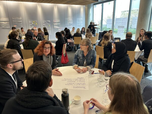 attendees talking at the Global Campus Summit